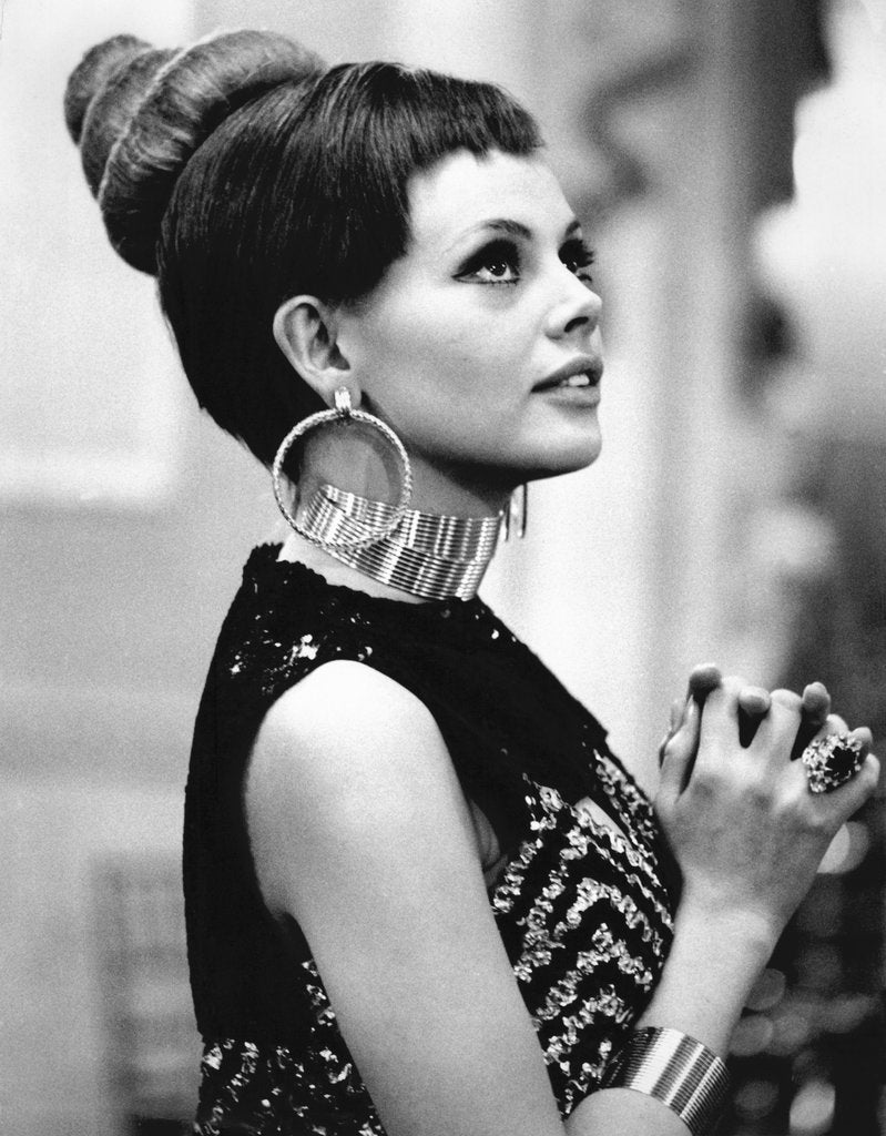 Detail of Britt Ekland in earrings by Associated Newspapers