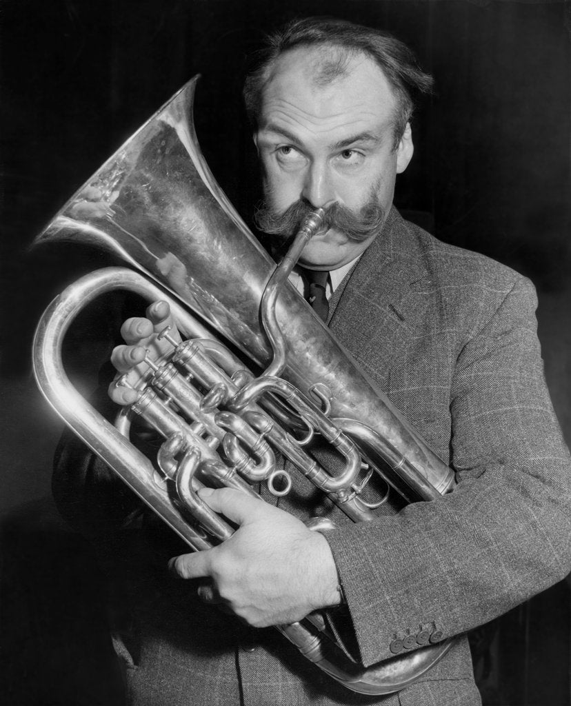 Detail of Jimmy Edwards playing the euphonium by Associated Newspapers