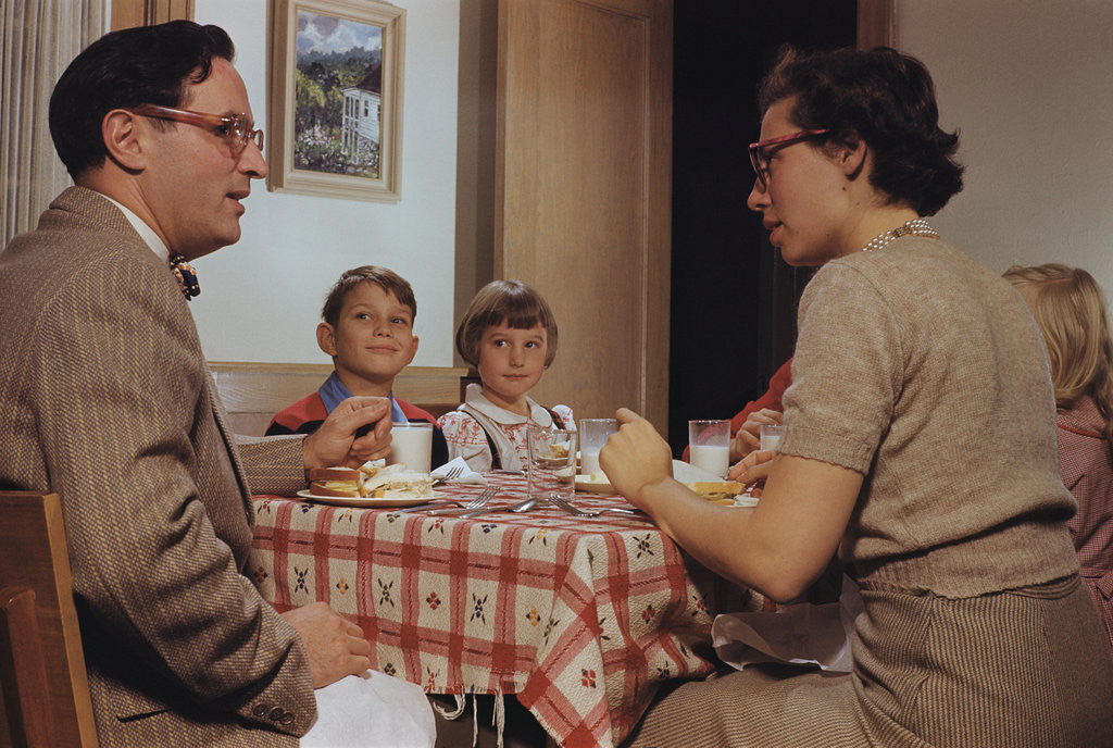 Detail of Children Sitting Quietly While Parents Talk by Corbis