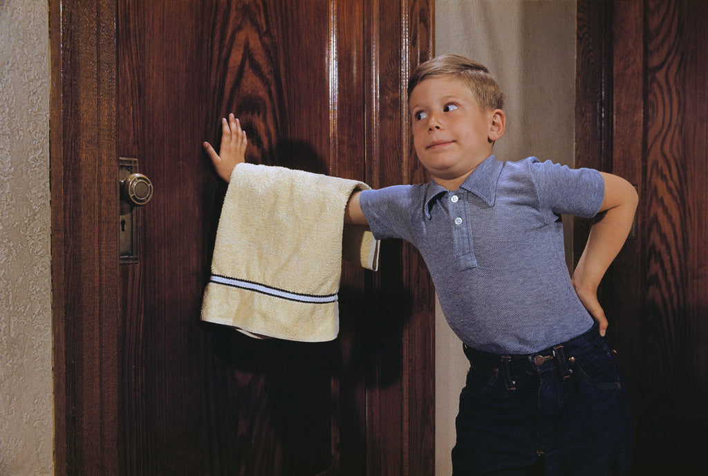 Detail of Boy Waiting to Enter Bathroom by Corbis