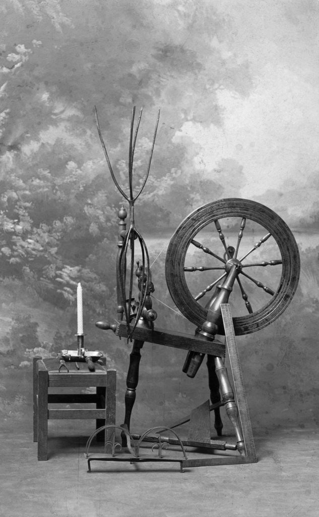 Detail of Old Time Spinning Wheel by Corbis