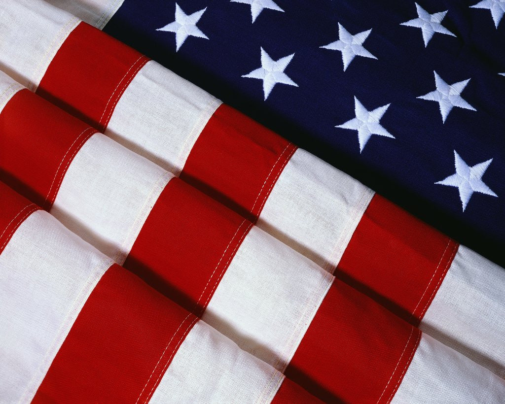 Detail of Folded American Flag by Corbis