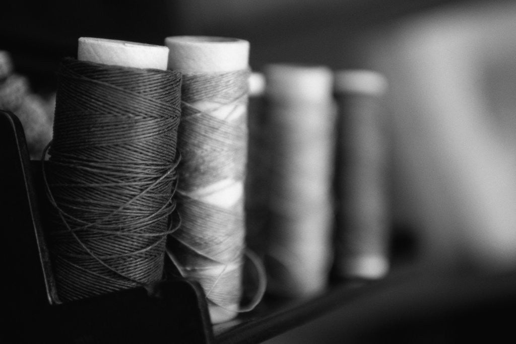 Detail of Spools of Thread by Corbis