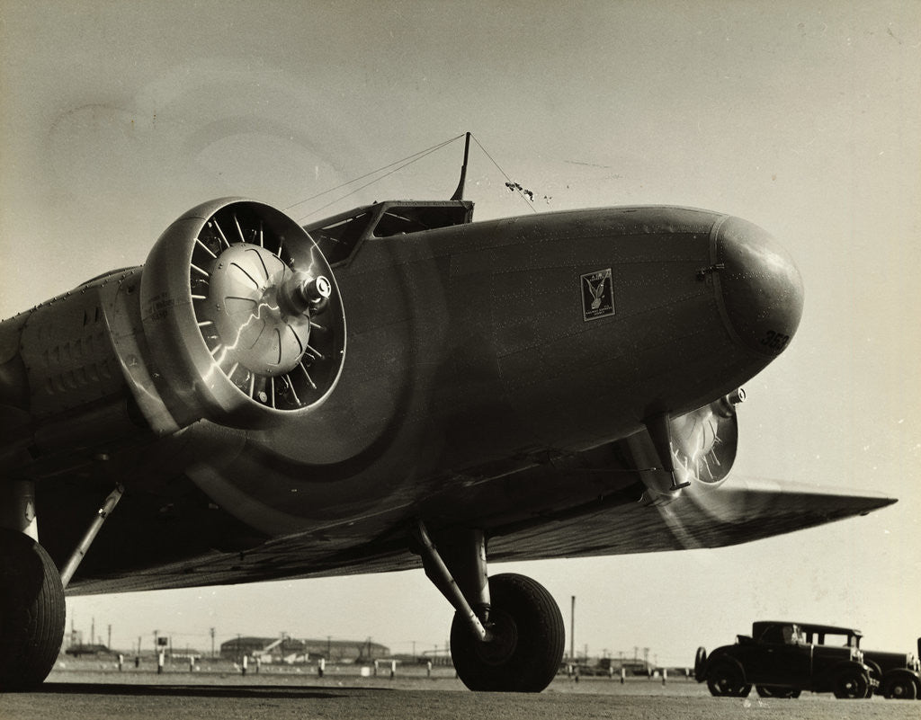 Detail of View of Airplane Nose with Propellers Spinning by Corbis