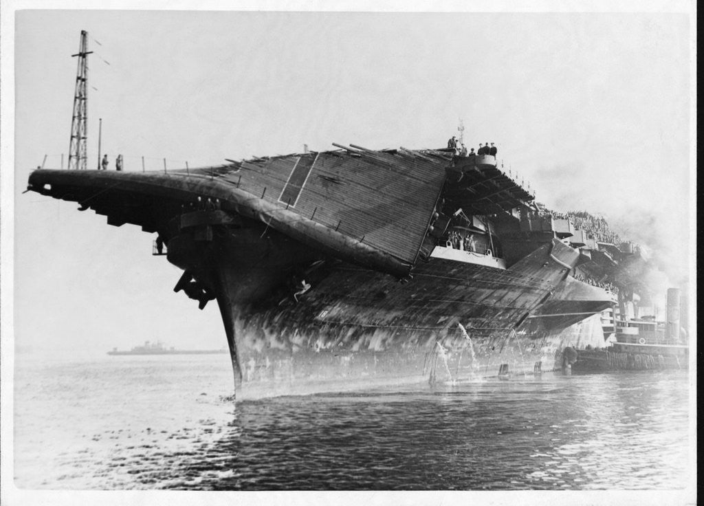 Detail of Tugs Tow Damaged Aircraft Carrier by Corbis