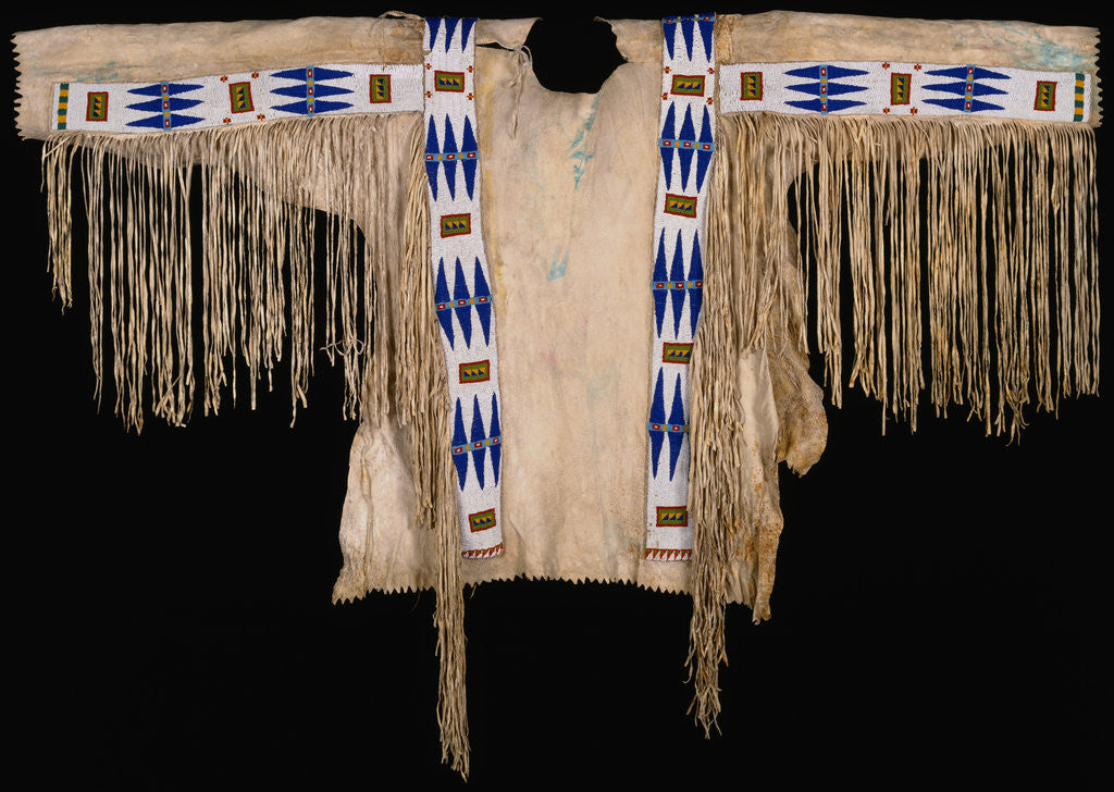 Detail of Assiniboine Warrior's Shirt Adorned with Beadwork and Fringe by Corbis