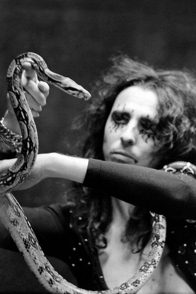 Detail of Alice Cooper with his pet boa constrictor by Anonymous