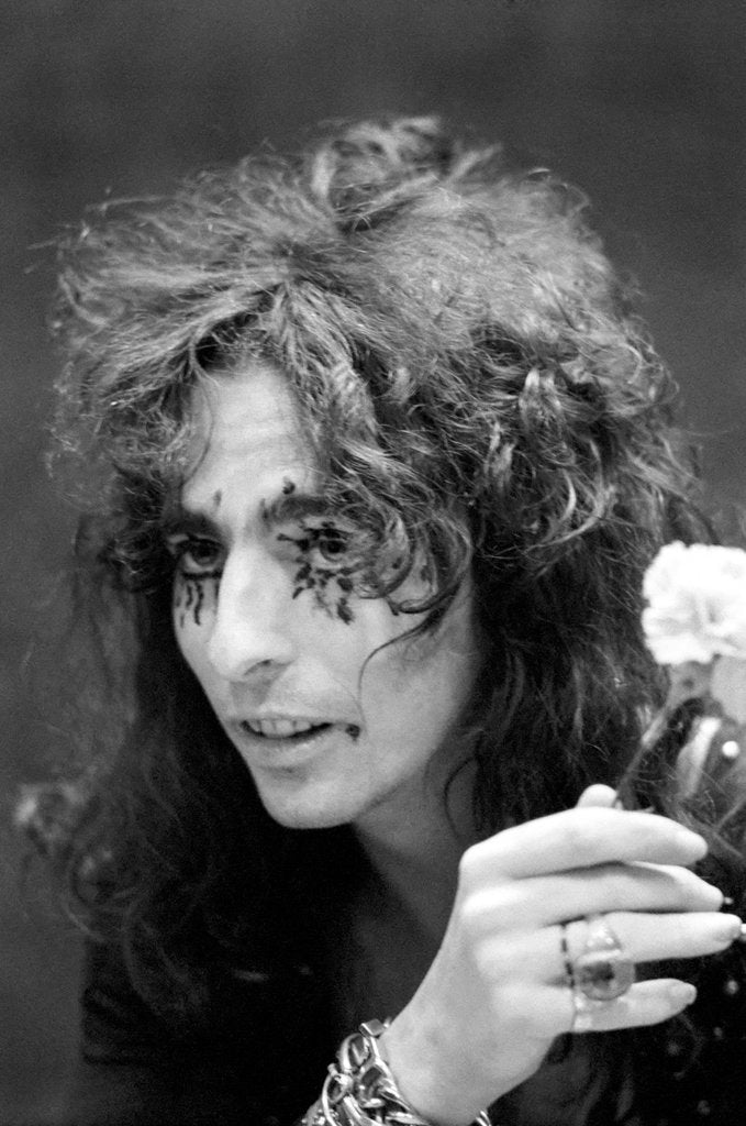 Detail of Alice Cooper with his pet boa constrictor by Staff