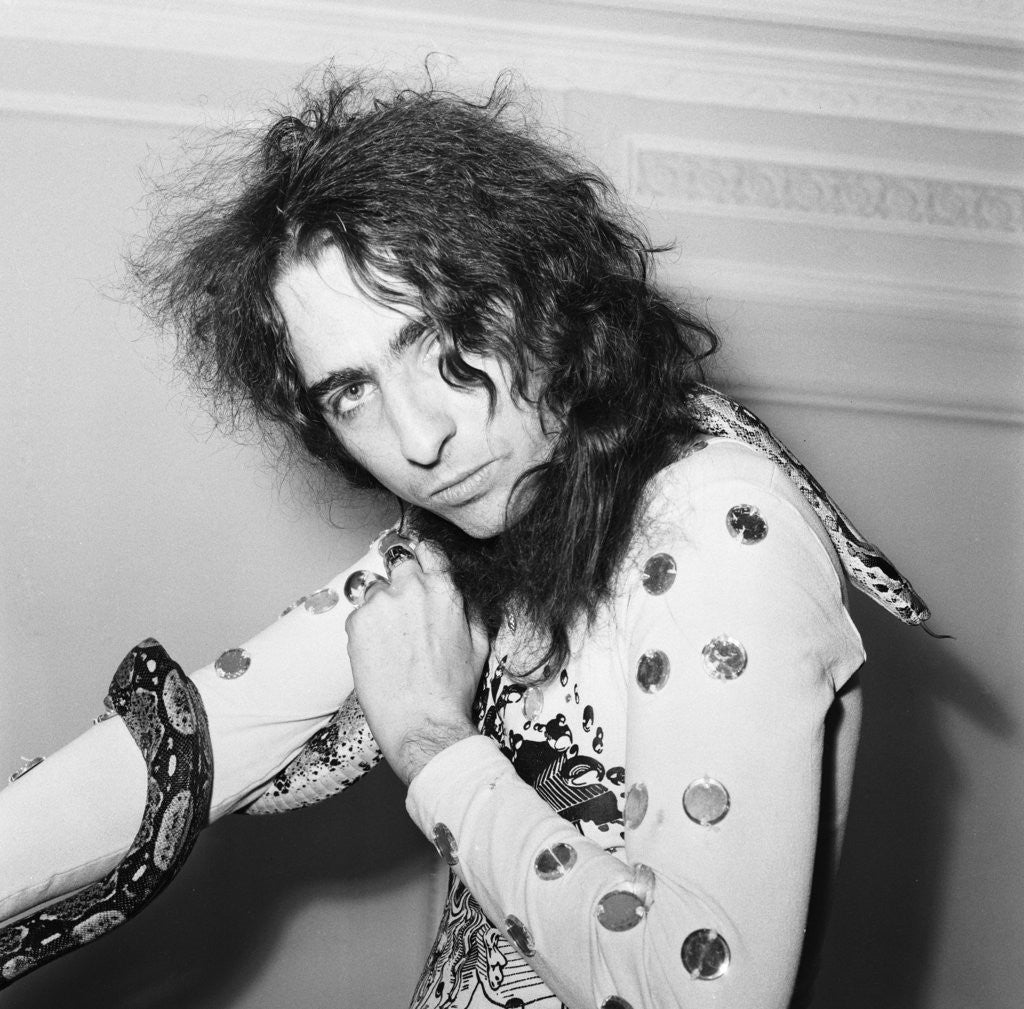 Detail of Alice Cooper poses with his snake by Peter Stone