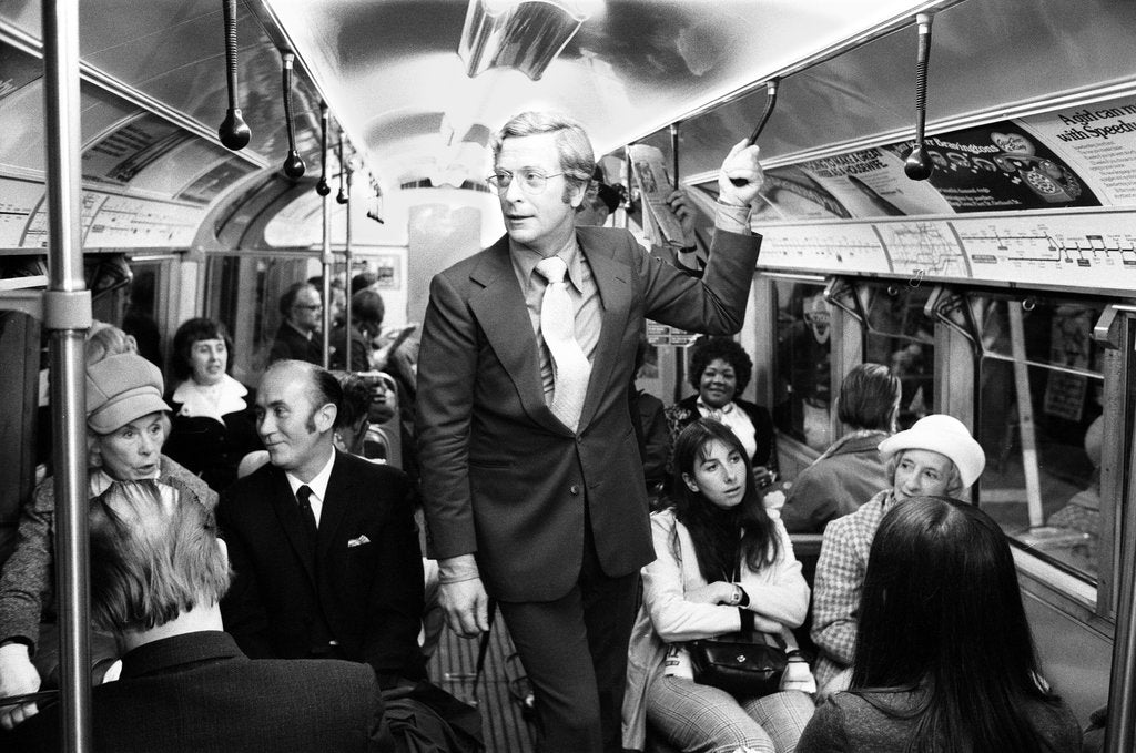 Detail of Michael Caine travelling on the underground by Alisdair MacDonald