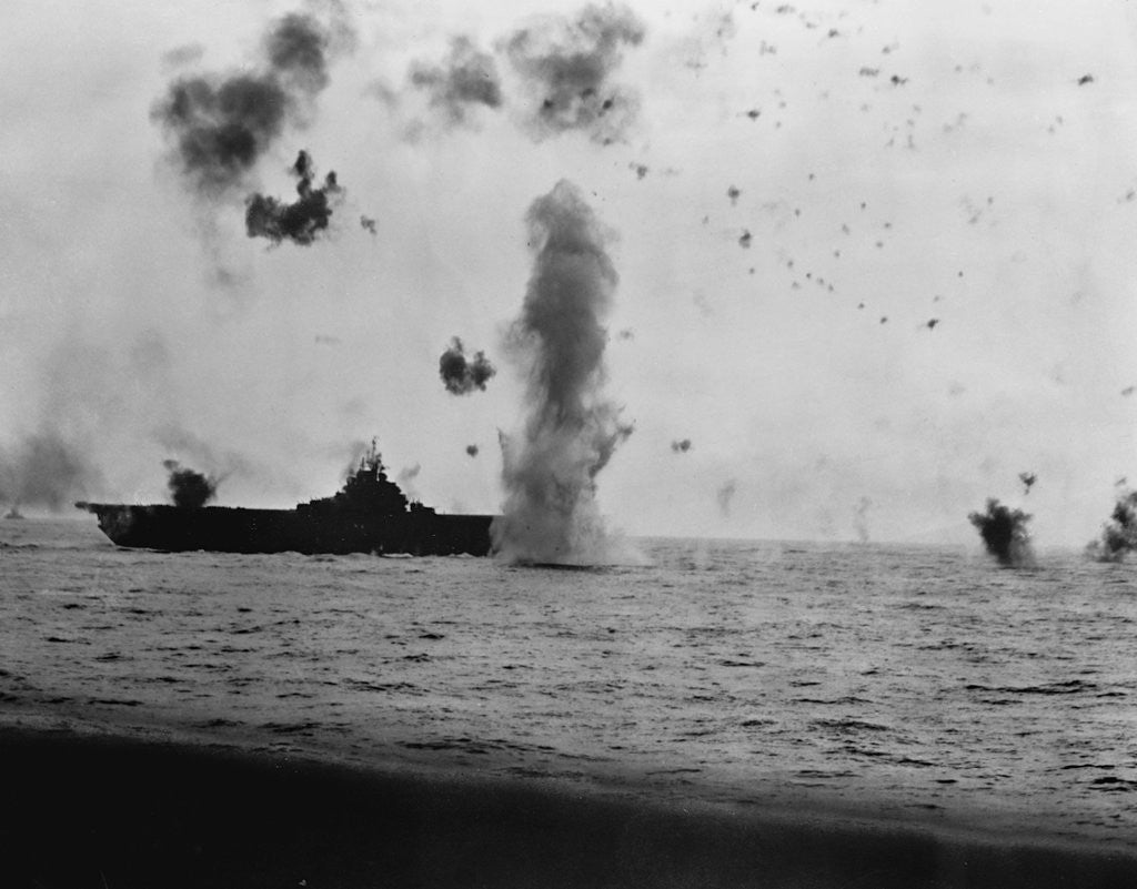 Detail of Japanese Kamikaze crashes alongside the USS Essex (CV9) as seen from the USS Randolph (CV 15). May 14, 1945 by Corbis