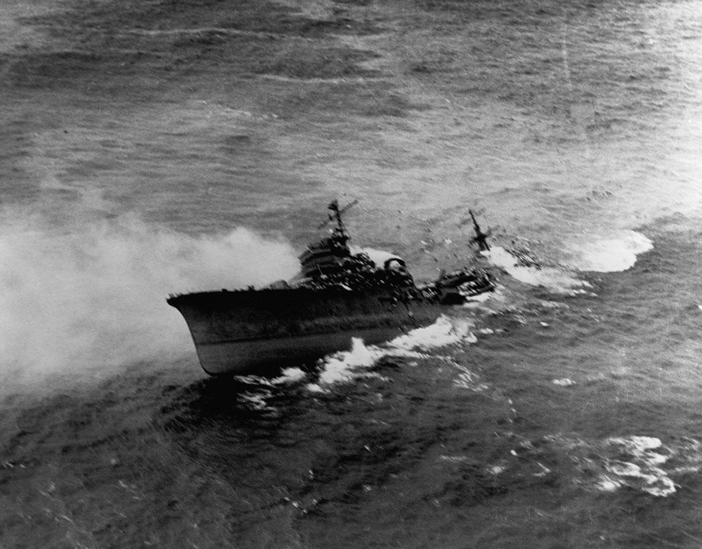 Detail of A Japanese cruiser (Katori Class) sinking off the coast of French Indo-China after attack by SB2c's from the USS Hancock. January 12, 1945 by Corbis