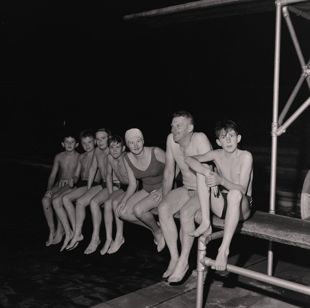 Detail of Peel swimmers at night by Manx Press Pictures