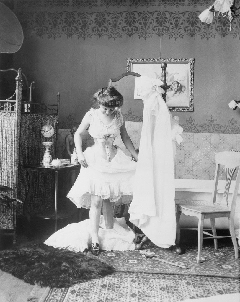 Victorian Woman Undressing in the Bath