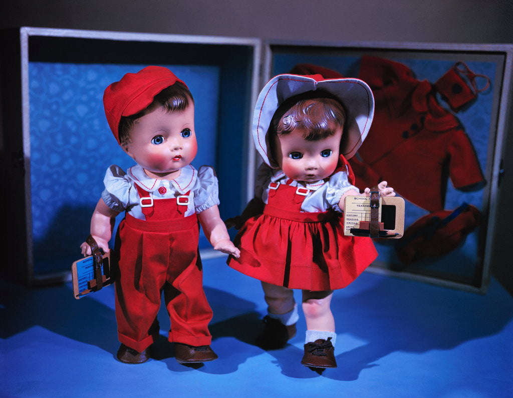 Detail of Boy and Girl Dolls Wearing Matching School Outfits by Corbis